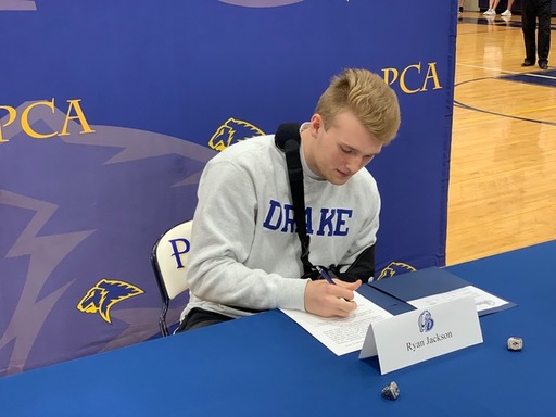 Ryan Jackson signs with Drake University.