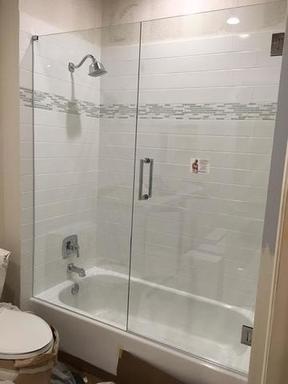 Frameless Shower Door and panel on tub (Copy).jpg
